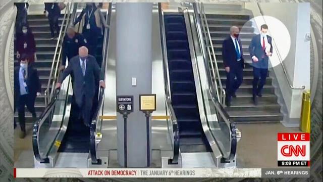 Hawley runs down Congessional escalator steps, on Jan 6, 2021: CNN still from video