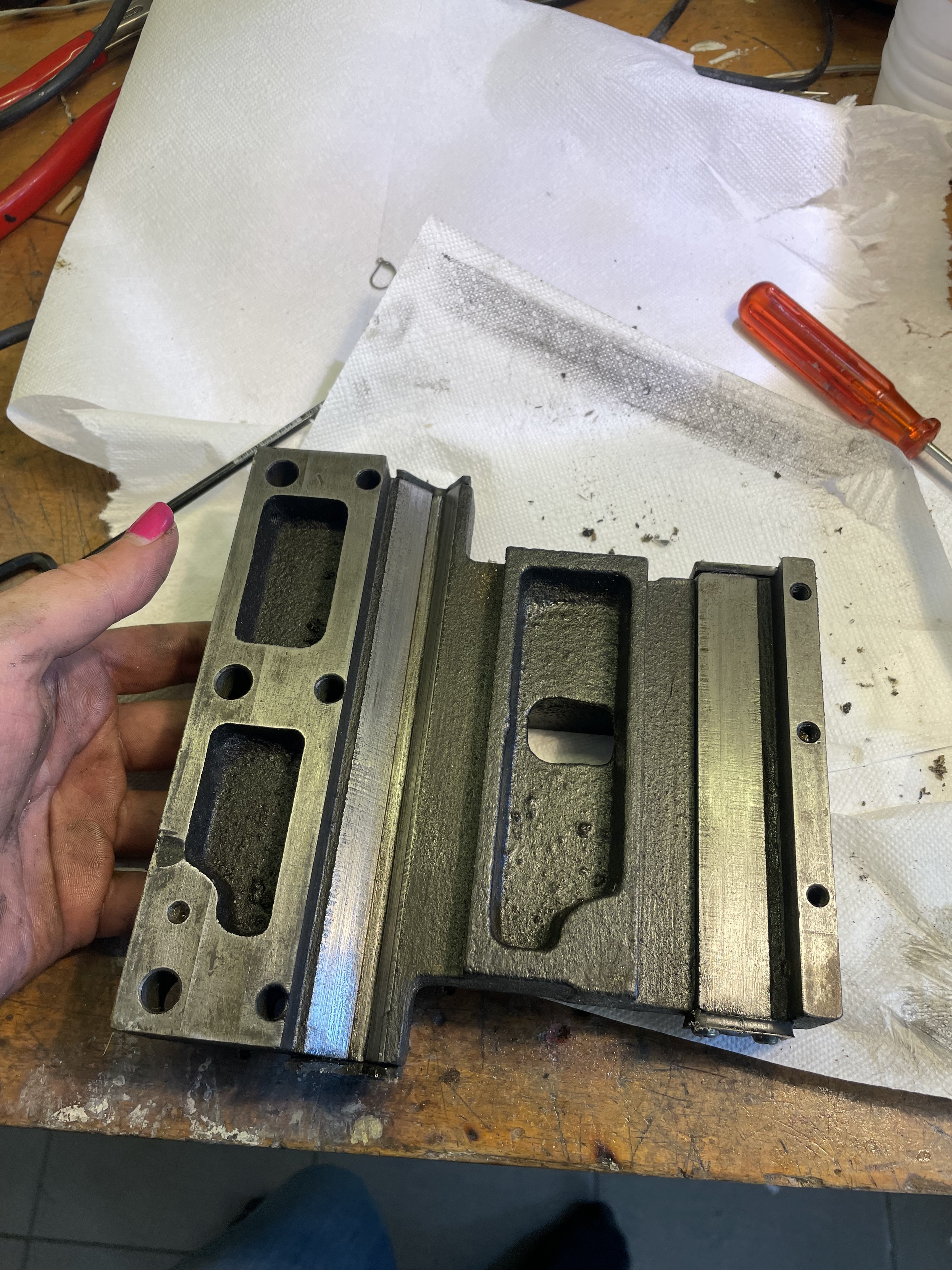 cast iron lathe carriage base on my workbench 