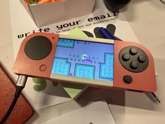 Photo of the Forefly Zero prototype running my game Lampy. 