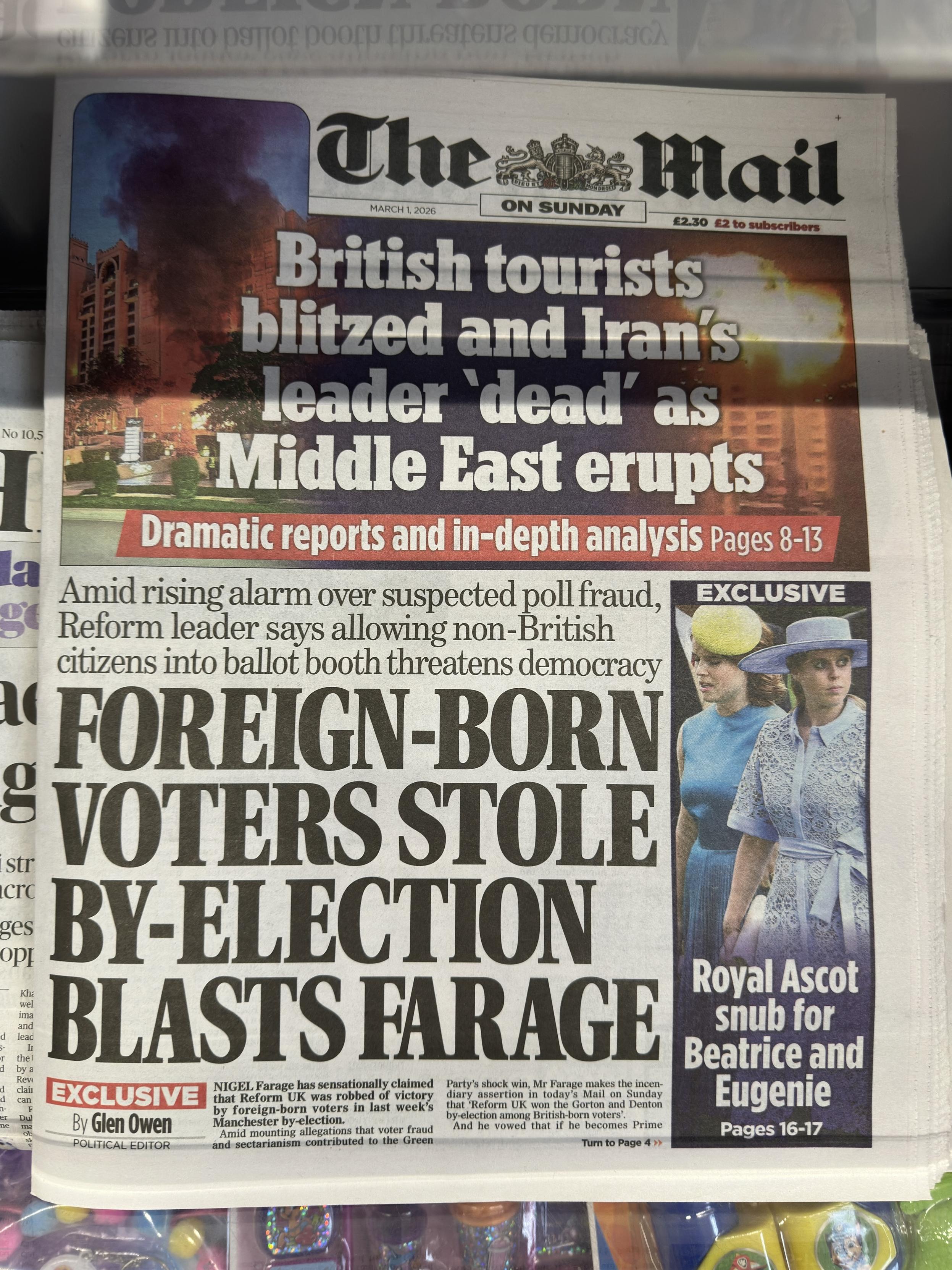 Newspaper headline "foreign born voters stole by election blasts Farage".