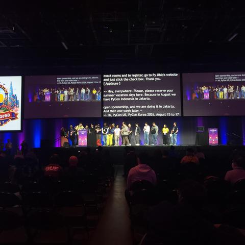 Two dozen-ish people on stage at PyCon US 2026
