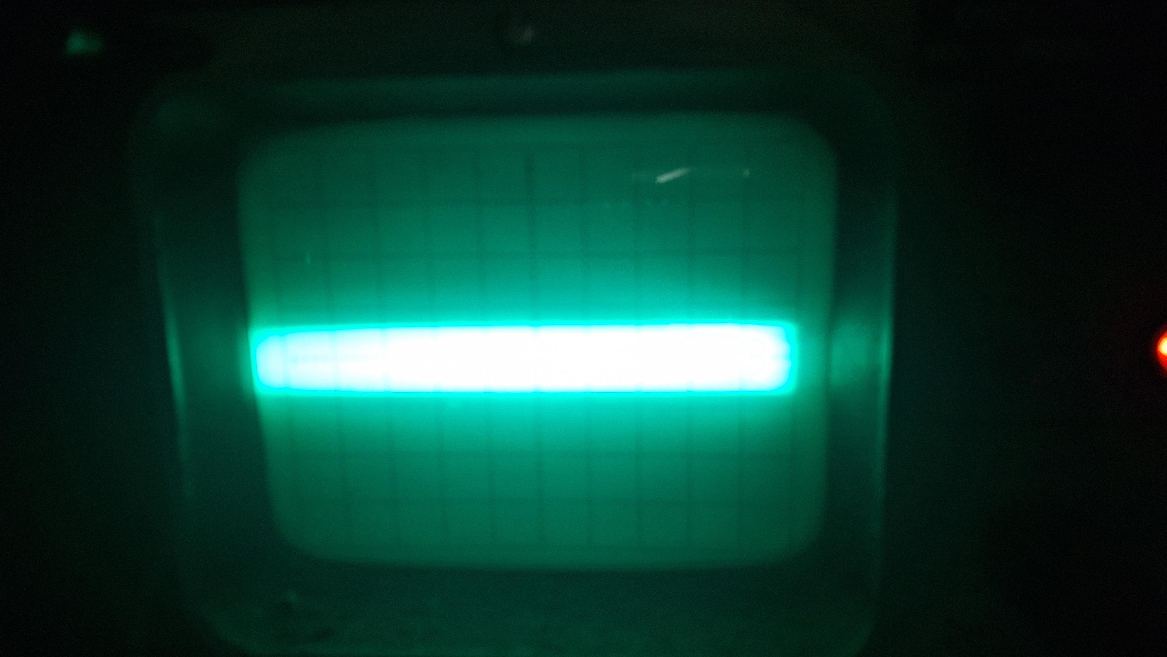 Close up of the screen in the dark showing the fat green bar.