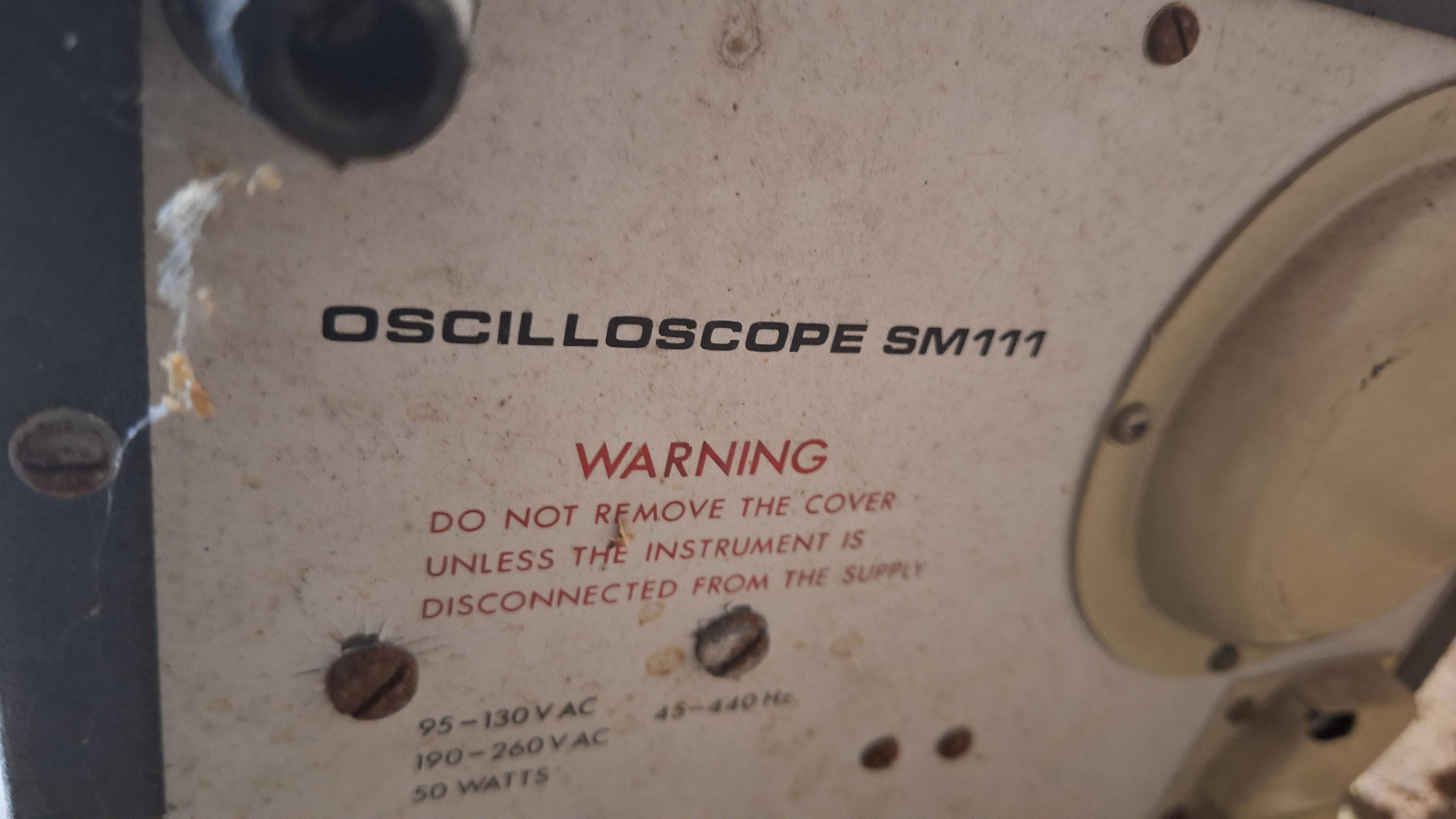 Close up of ths back showing the model number SM111