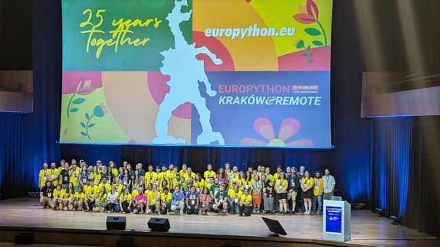 EuroPython closing event with as many volunteers on stage as could make it