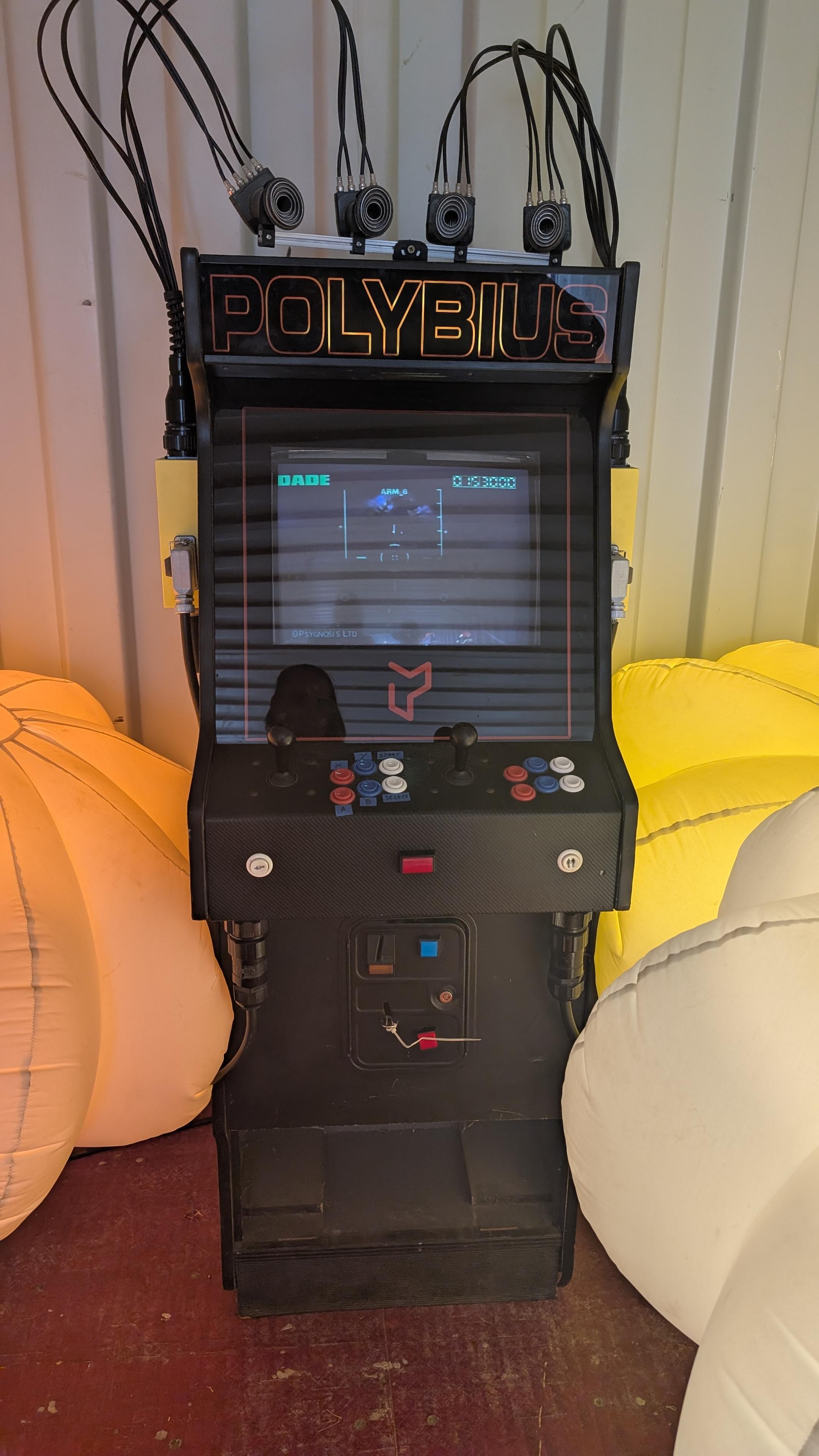 a classic arcade cabinet game with the name POLYBIUS