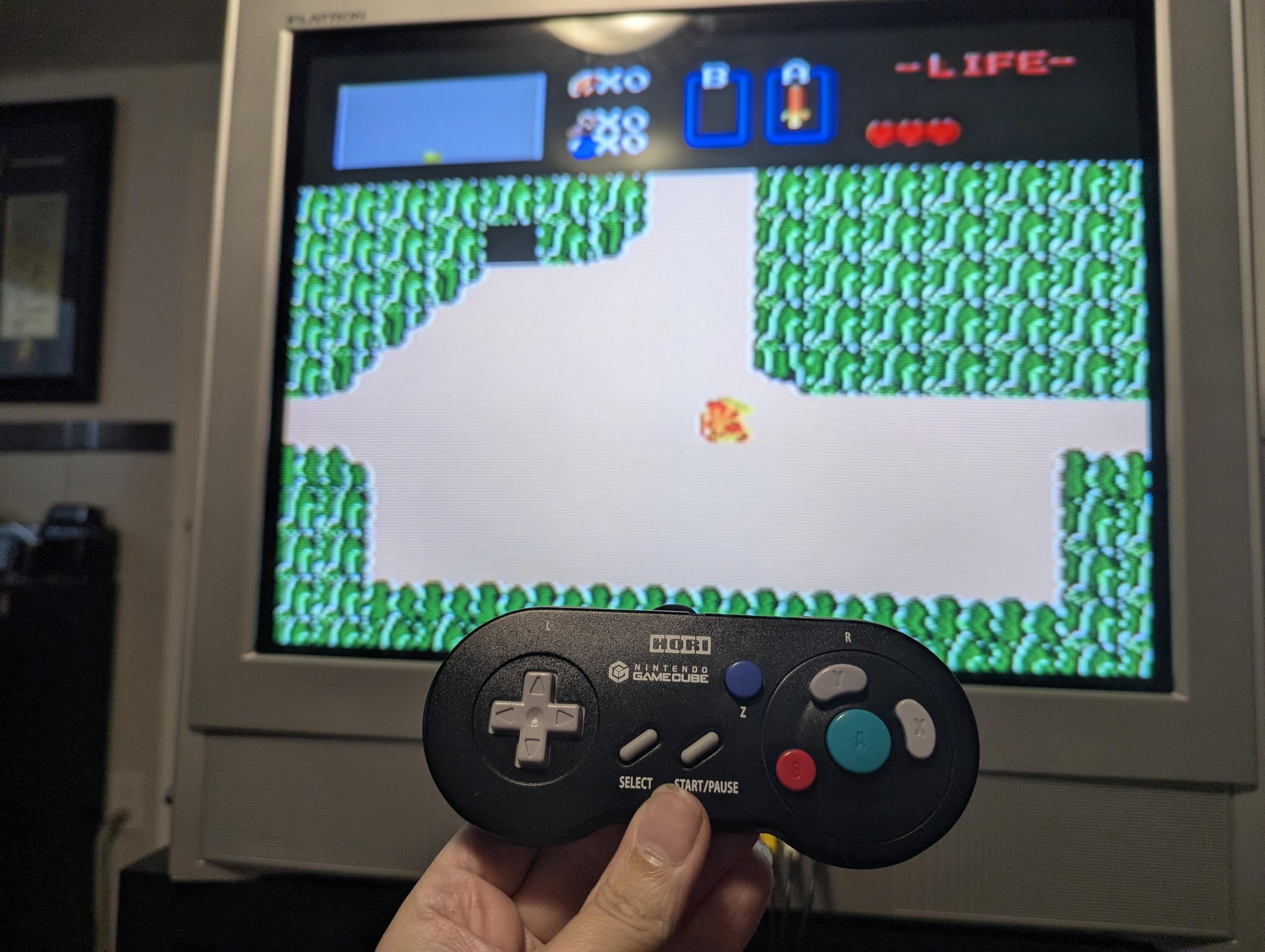 Classic Zelda 1 on my CRT with me holding the Hori controller in the foreground