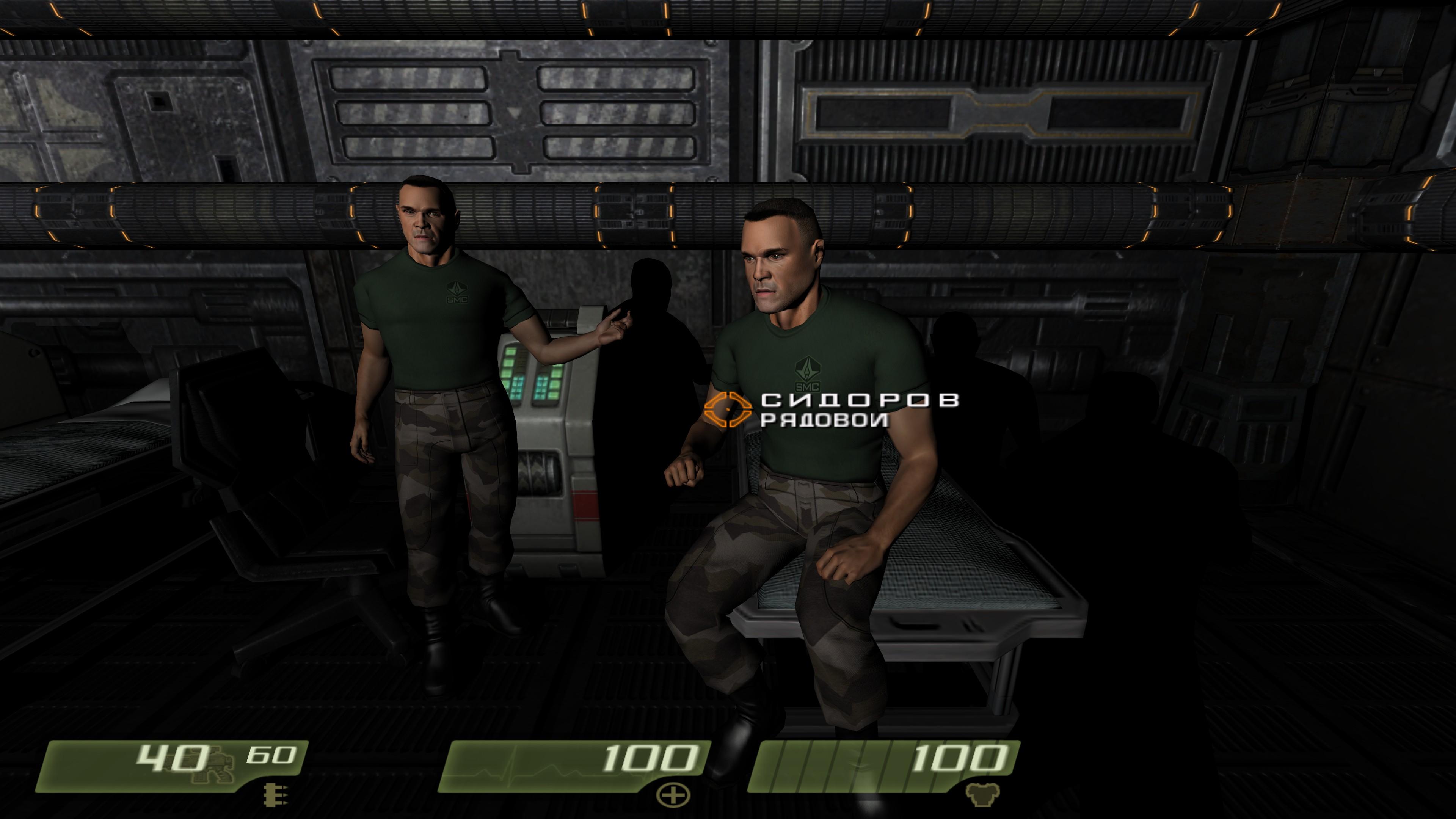 two marines, one sitting on a medical bed and another standing and gesturing to the other marine, in Quake 4. Looks like the game is in Russian, too.