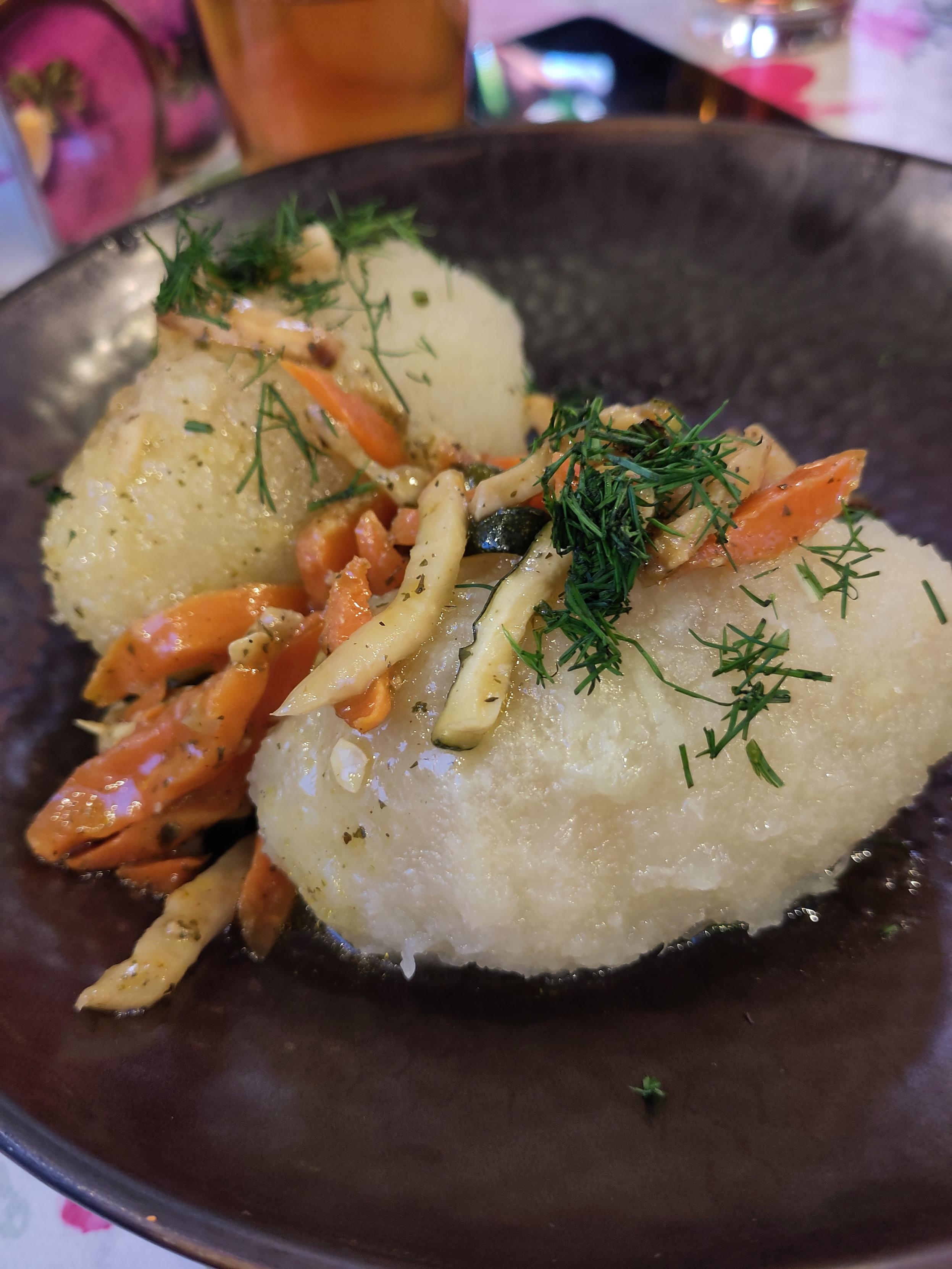 Cepelinai are giant sort of gelatinous potato pastry filled with cottage cheese or meat and garnished by cracking. This excellent vegan version was filled with soy sausage and garnished with cooked vegetables that may have been vinegar pickles. At Bernelių Užeiga in Vilniaus