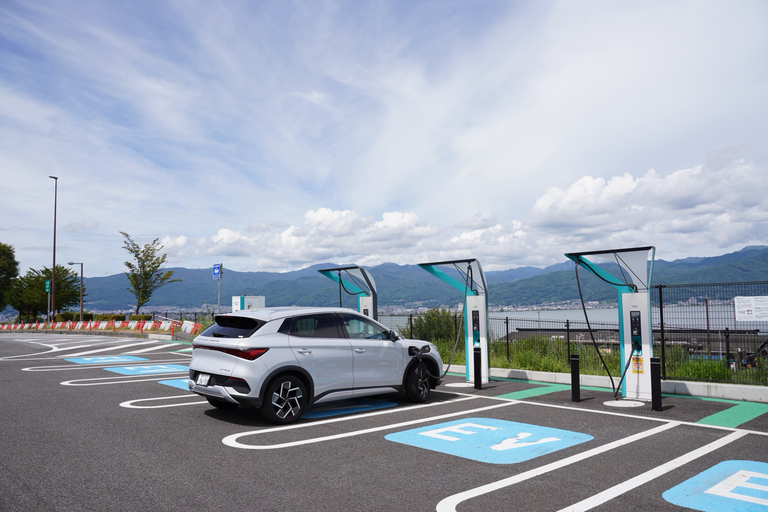 BYD Atto 3 charging by Lake Suwa
