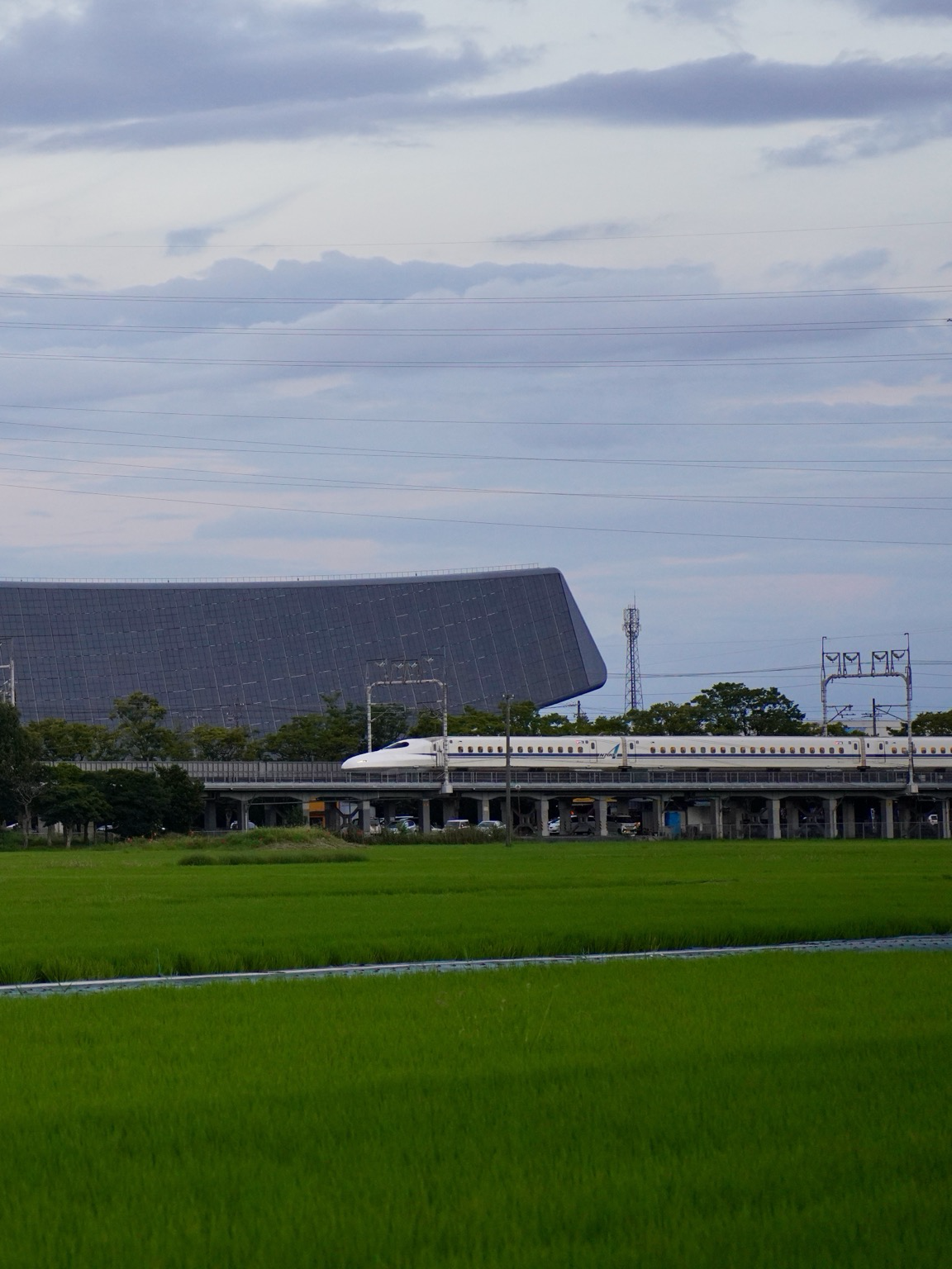 Shinkansen passing in front of the Solar Ark
